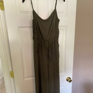 Wide leg green jumpsuit with tie waist